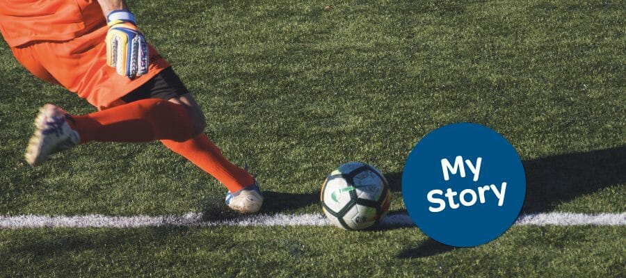 Person kicking a football