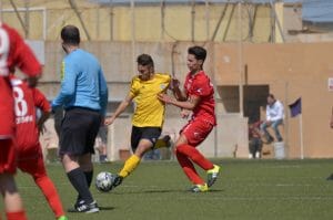 Kyle playing football