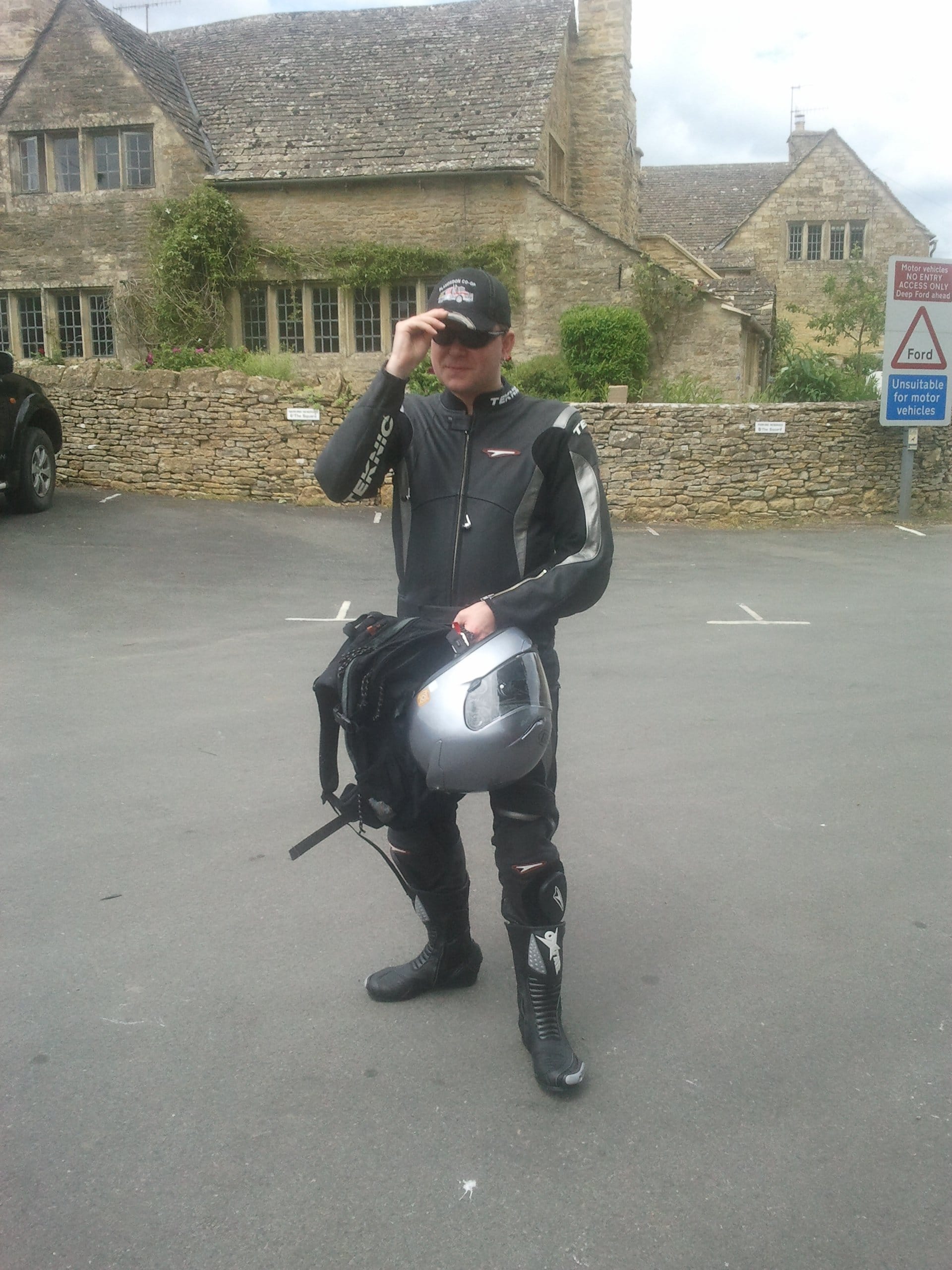 Iain Riddell Iain Riddell holding his motor cycle helmet