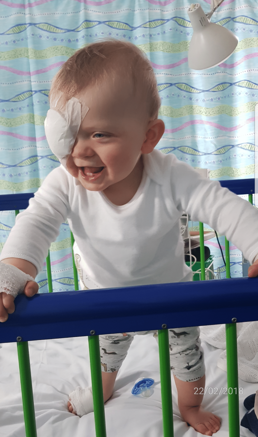 RS3167_20180805_194733 Ernie Holt in hospital with an eye bandage over his right eye. Still smiling though!