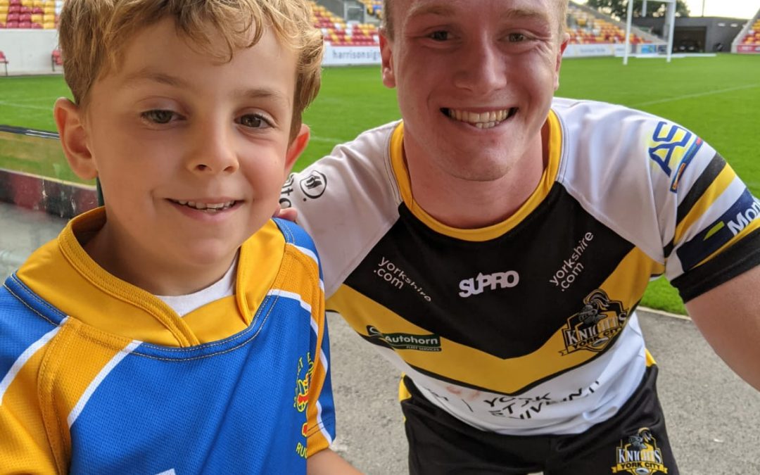 Charlie meets his ‘rugby twin’