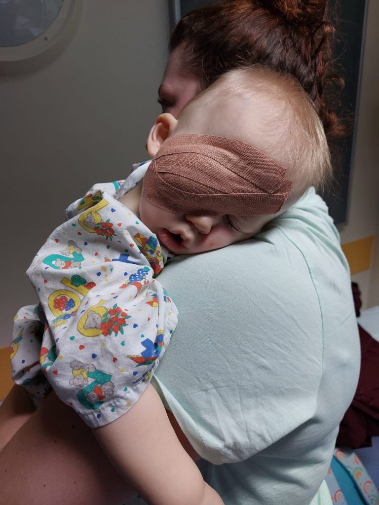 AJ bandanged up after his operation