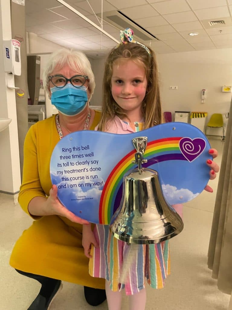 Lesley with a member who is ringing the bell