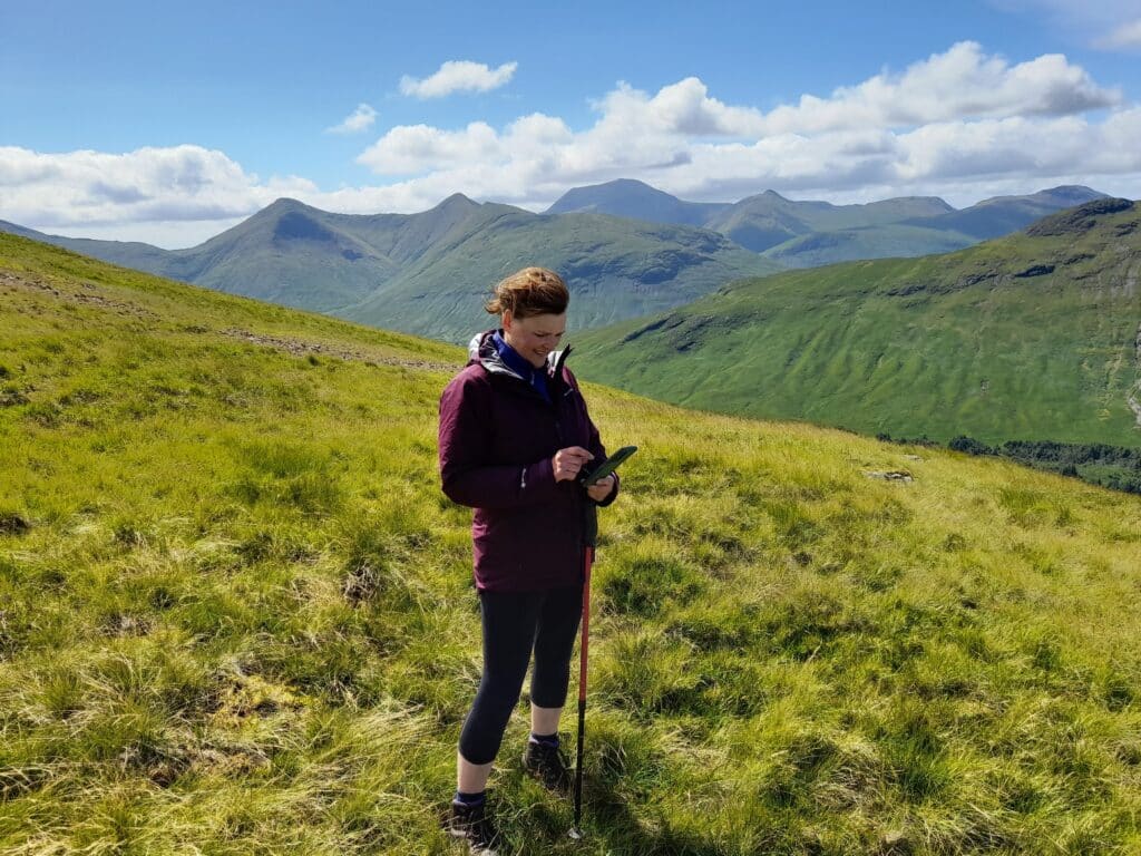 Caroline stood outside in a field