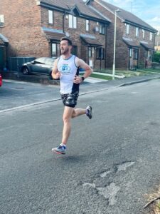 Phil running outside