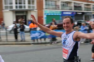 Ben is running and smiling