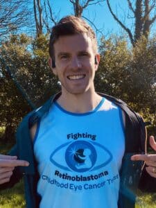 Stephen is stood outside smiling