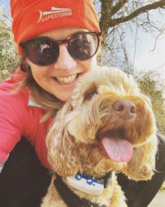 Victoria is cuddling her dog