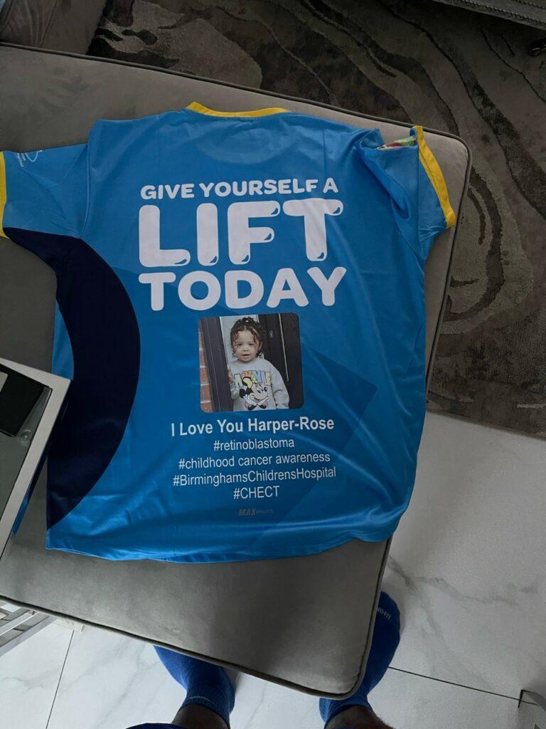 Festus' CHECT top has been personalised with a photo of Harper