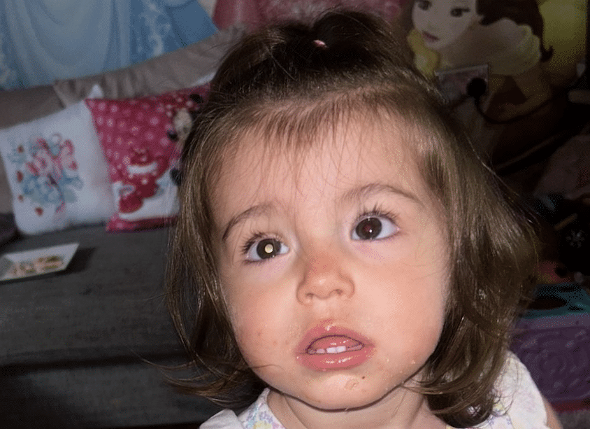 Evie has a white glow in her eye