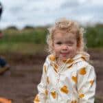 A child smiling at the camera