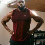 Michael posing at the gym after having retinoblastoma