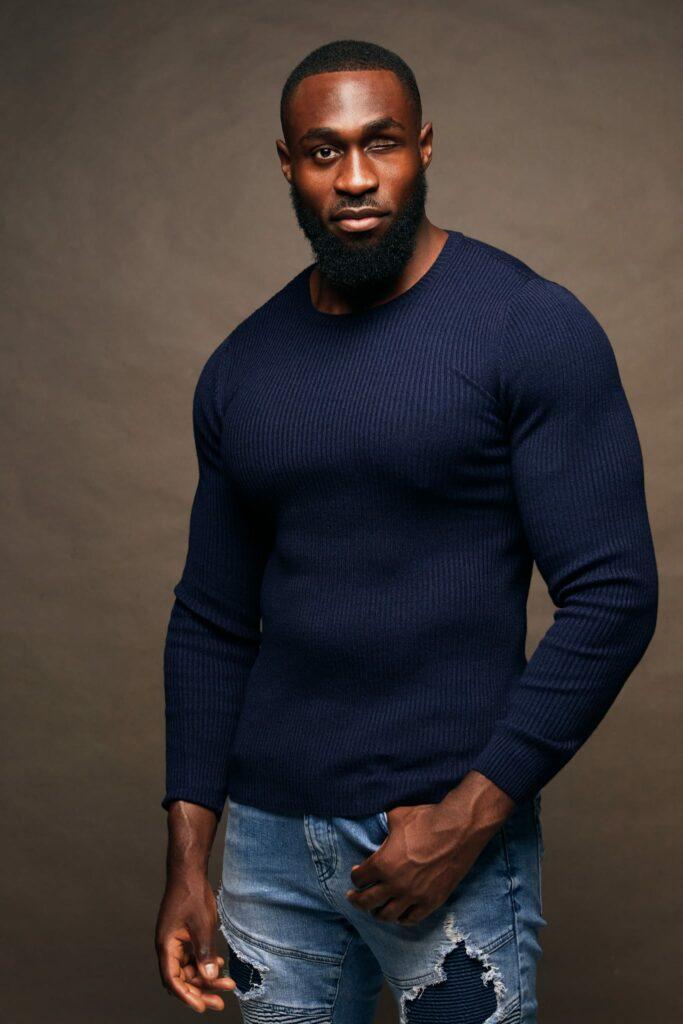 Michael on a modelling shoot. Michael had retinoblastoma as a child, he doesn't have his prosthetic eye in