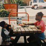 Michael with his sister as a child