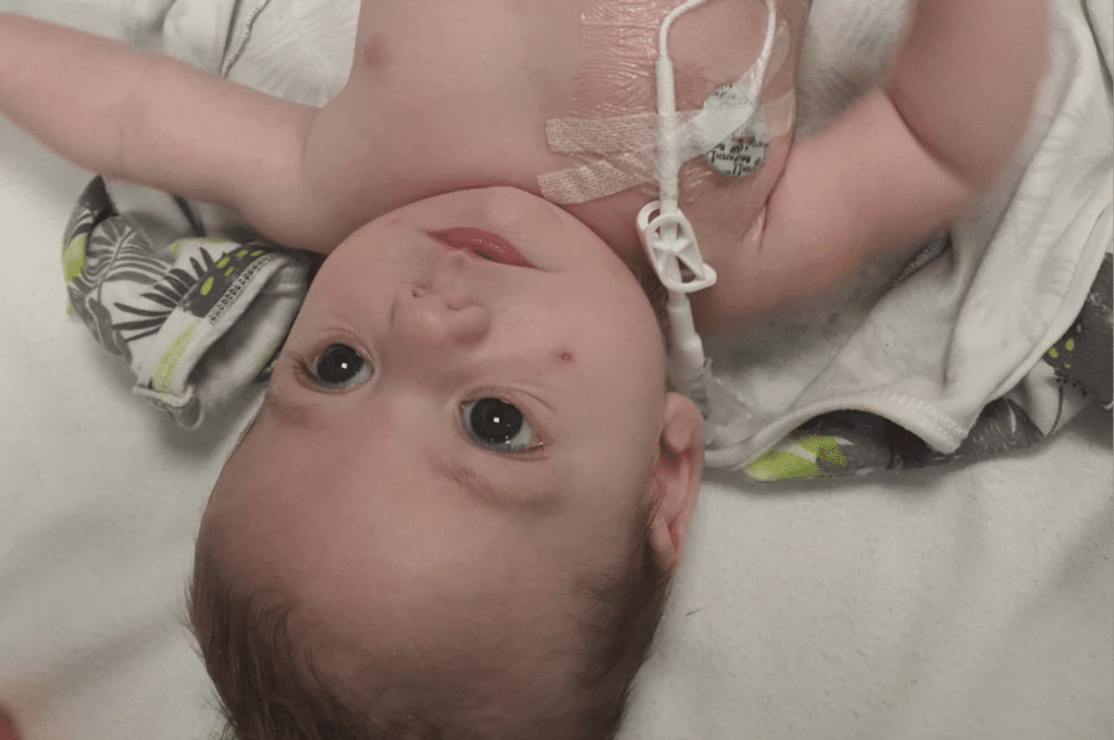 Thomas with tubes in at hospital