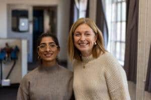 Priyanka and Petra smiling at the camera
