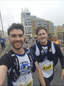 Tim and Alex running in CHECT tops