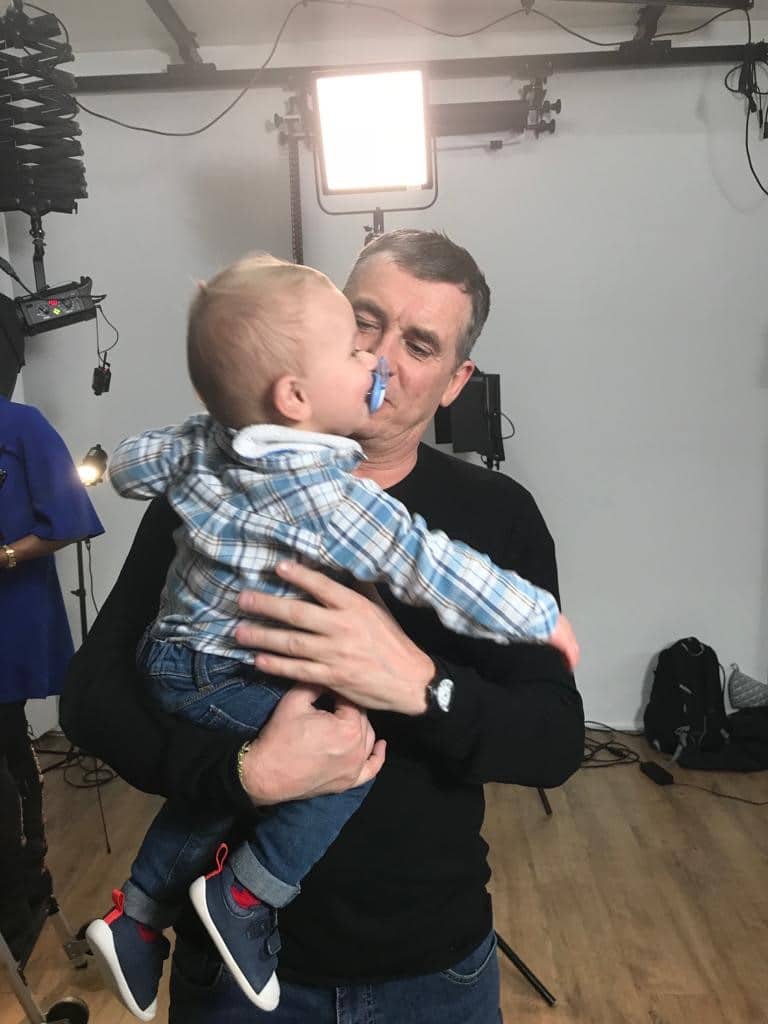 Baby Ethan is being held by Eastenders actor Shane Ritchie