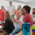 A family are watching the CHECT champion awards