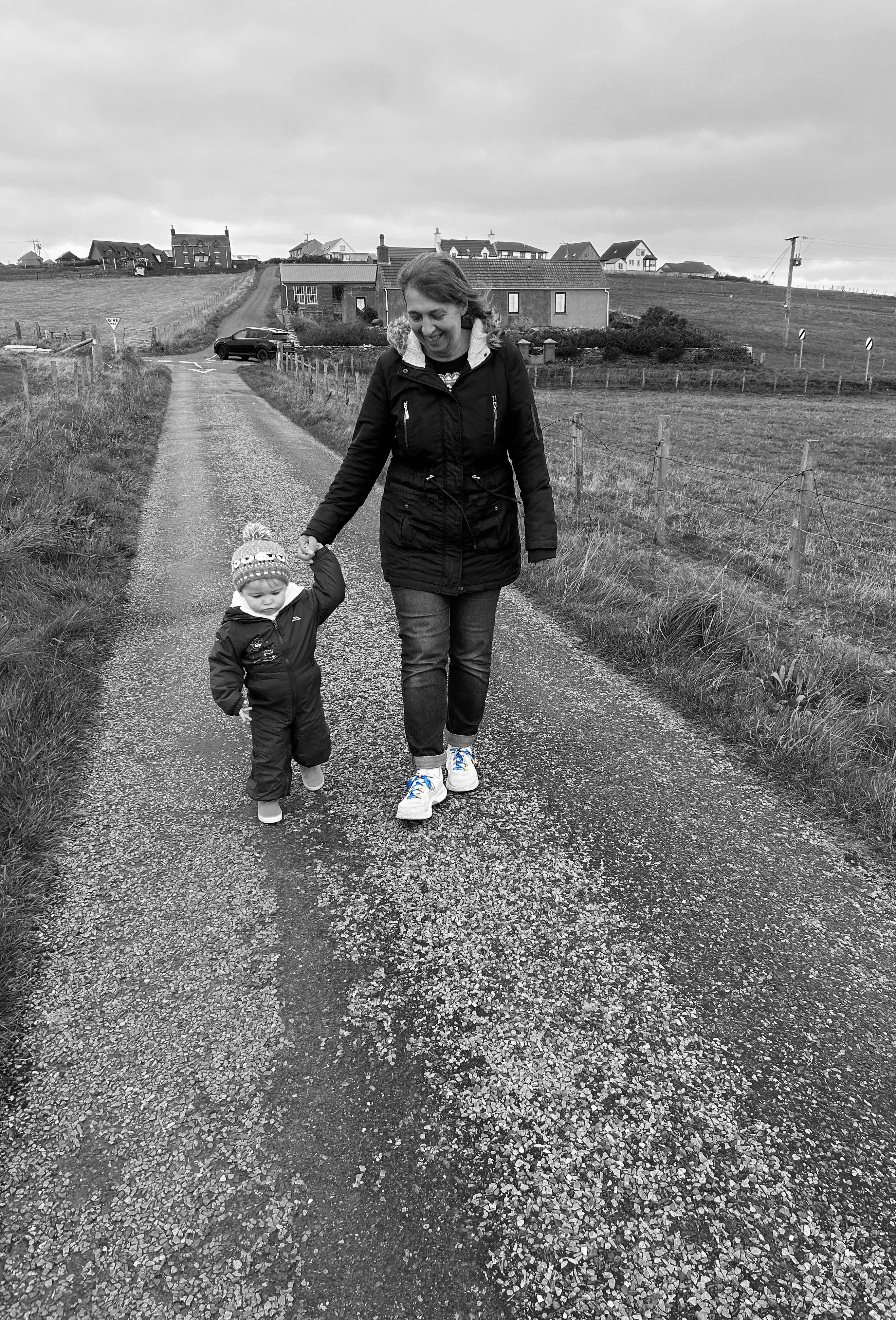 IMG_8102 Image shows mum and child hand in hand walking down a country road doing the 50km your way challenge