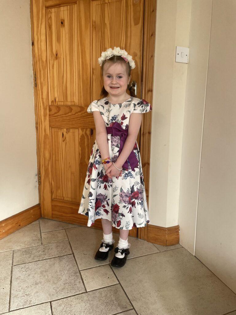 Rachel now, in a pretty flower dress