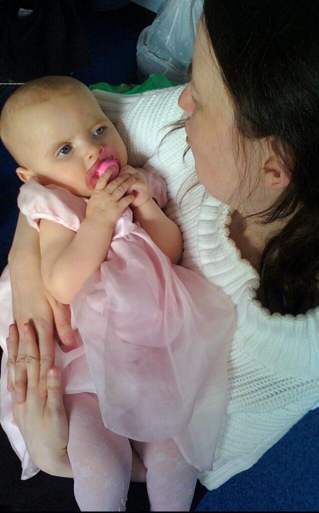 Candice is holding a baby Lucy