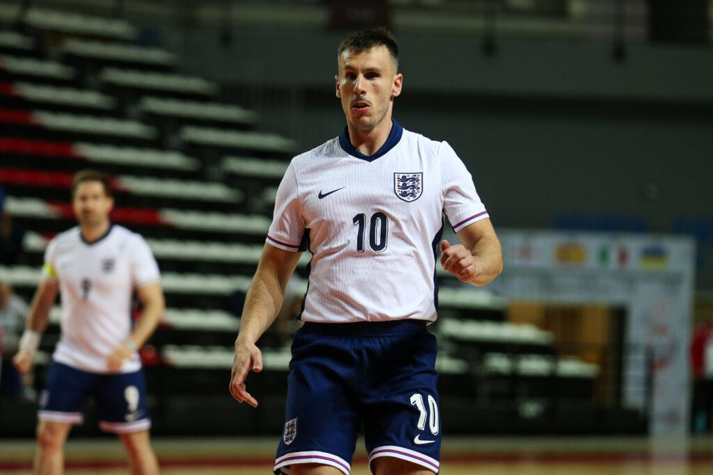 Adam playing football