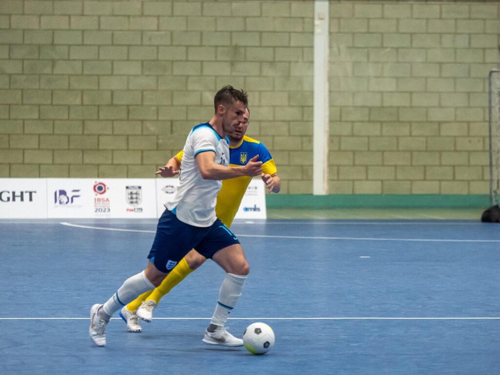 Adam playing football