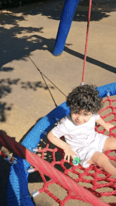 Shuhd playing at a park