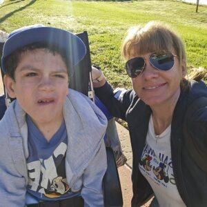 Helen is with her son in the sunshine