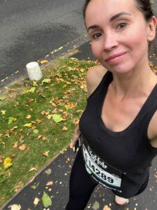 Natalie is outside in exercise clothes